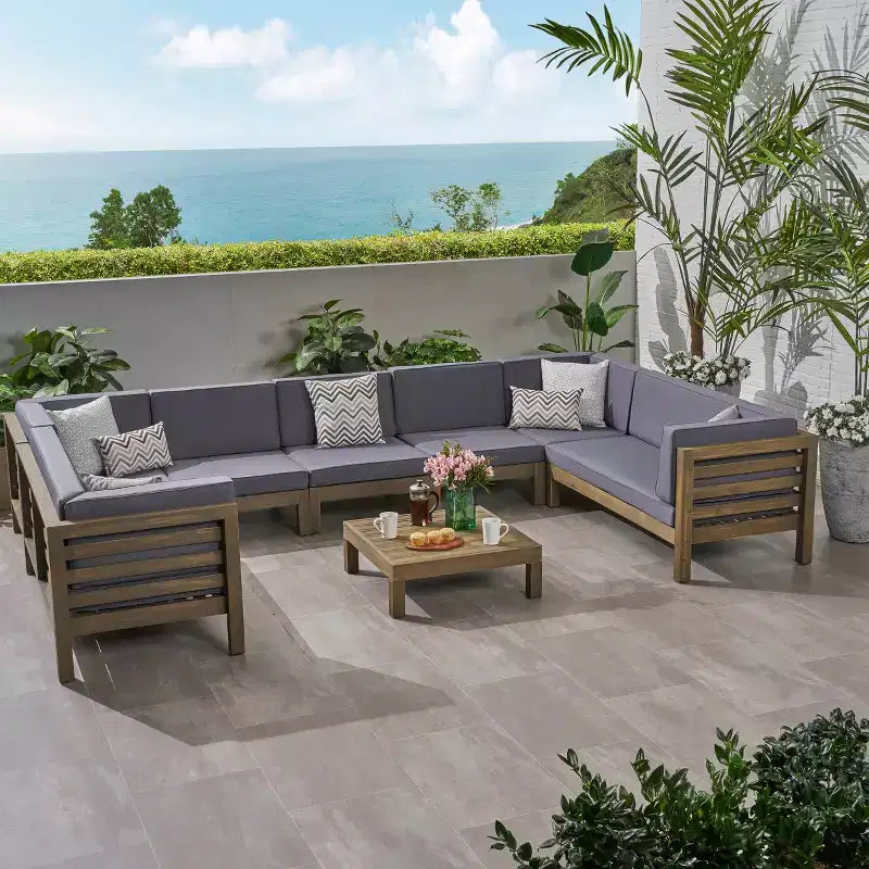 GDFStudio Cascada, set divano sezionale a 9 posti per esterni in legno di acacia con cuscini