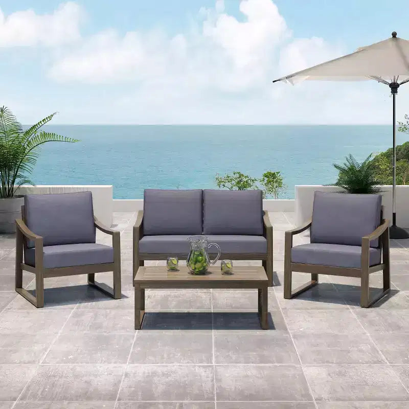 Christopher Knight Home Samwell - Set da salotto da esterno a 4 posti in legno di acacia con cuscini resistenti all'acqua