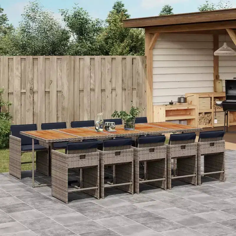vidaXL Set da Pranzo da Giardino 11 pz con Cuscini Mobili da Giardino Esterni Rattan Sintetico Grigio, Piano in Legno di Acacia, Cuscini Blu Scuro