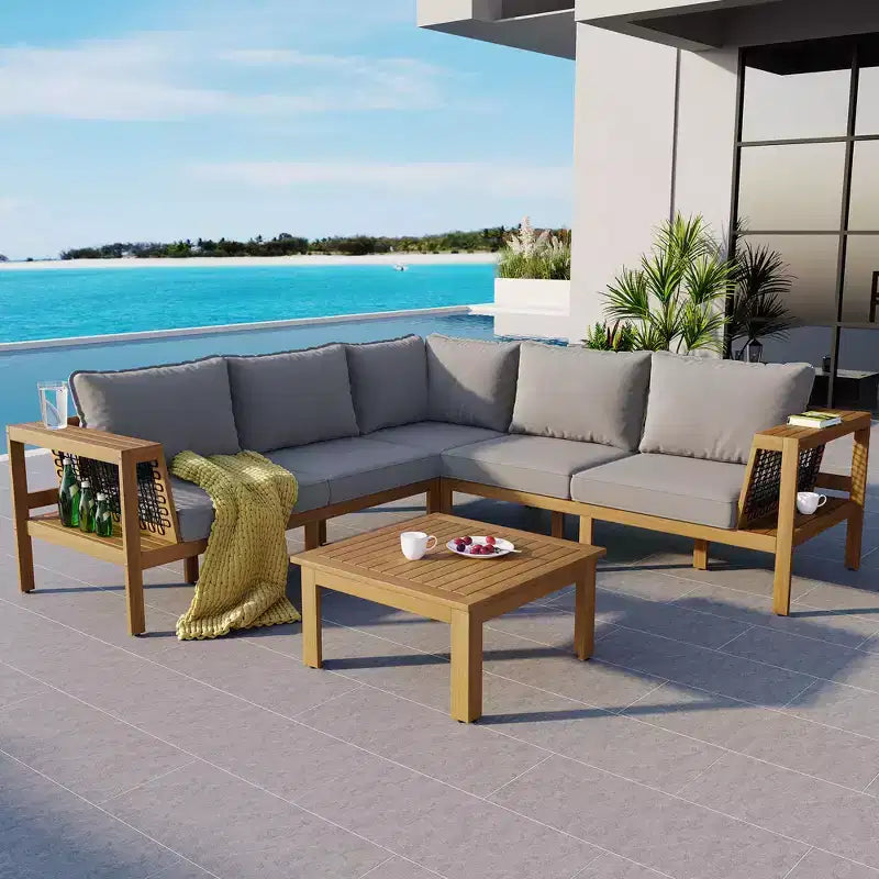 GDFStudio Alberta - Set da Patio Moderno a 4 Pezzi con Divano a L in Legno di Acacia, Braccioli in Corda Intrecciata, Tavolino da Caffè e Cuscini