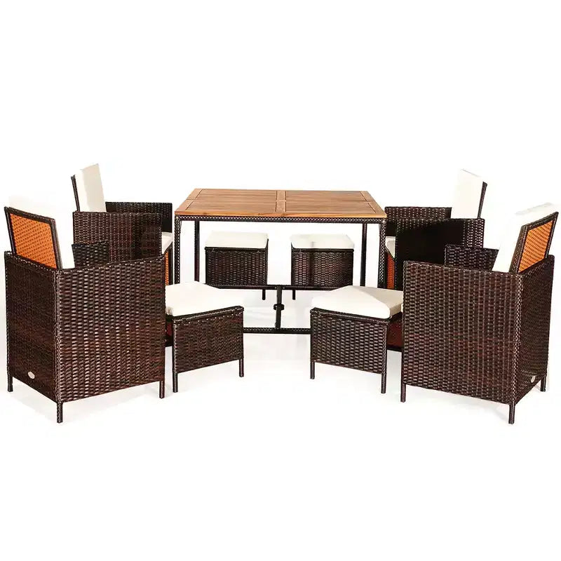 Set da pranzo da esterno in rattan con 9 pezzi in legno di acacia Costway, sedie imbottite e pouf