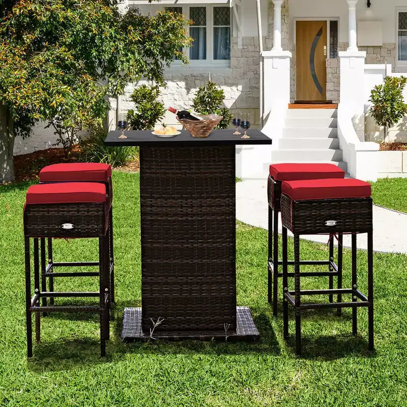 Costway Set 5 Pezzi Tavolo da Bar e Sgabelli in Rattan da Esterno con Ripiano Contenitore Nascosto e Cuscini