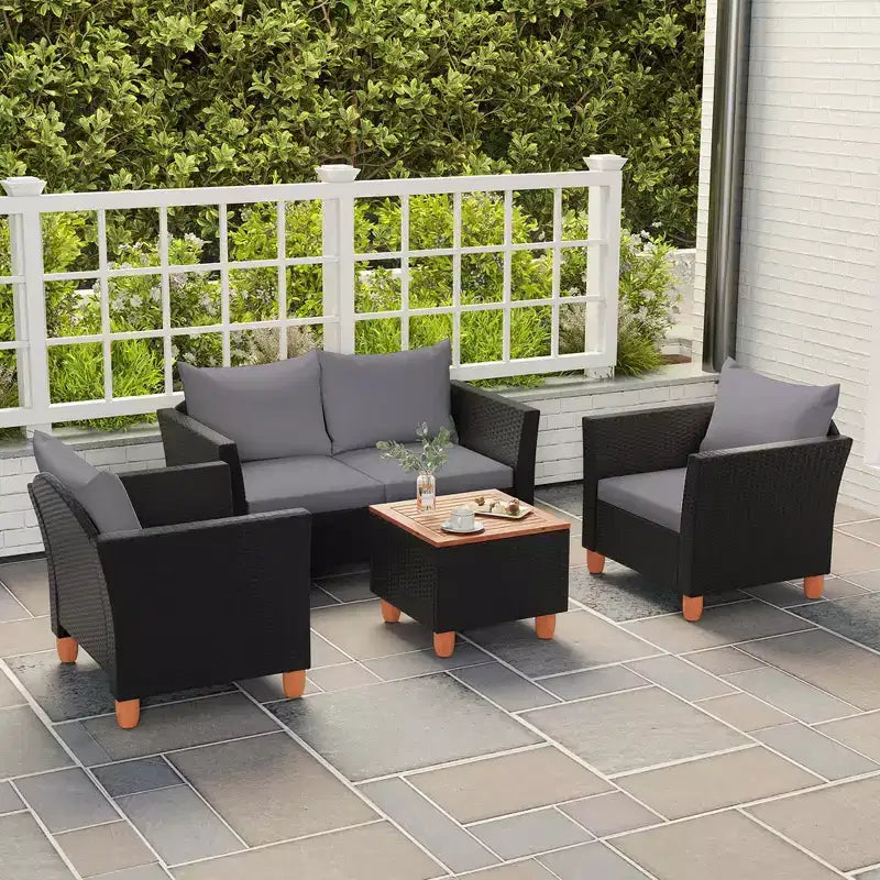 Set mobili da giardino Costway 4 pezzi in vimini con cuscini rimovibili, tavolino da caffè contenitore Bianco/Blu navy/Grigio