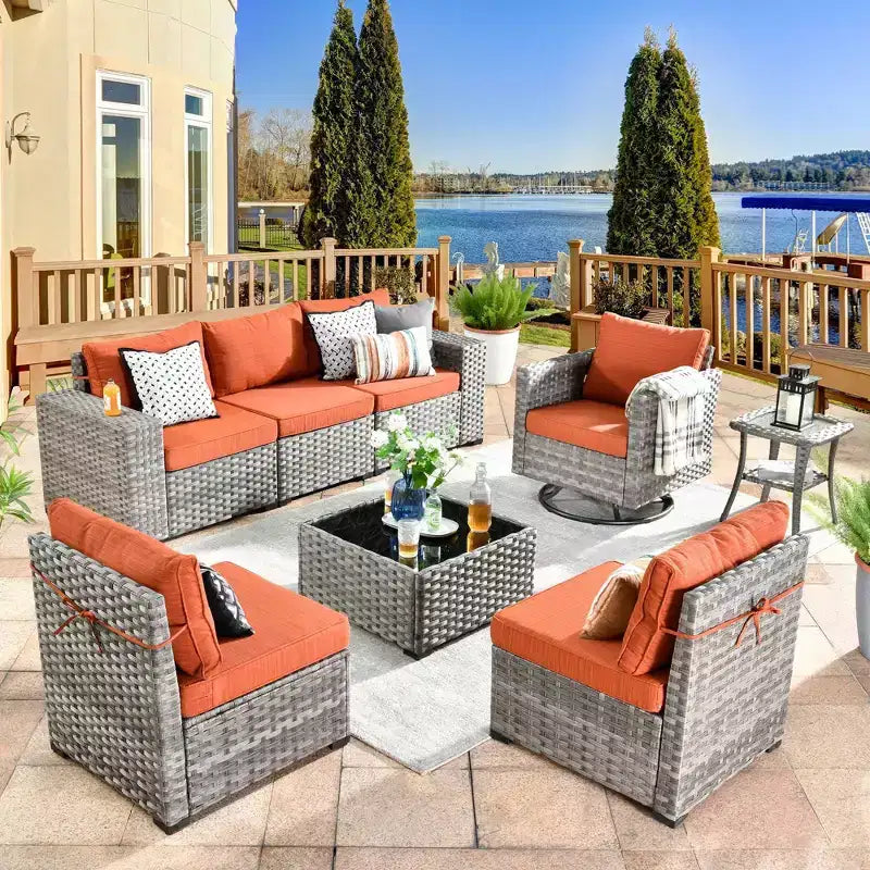 Marlton Set di mobili da esterno in vimini a 8 pezzi per patio, divano componibile con poltrona girevole e cuscini